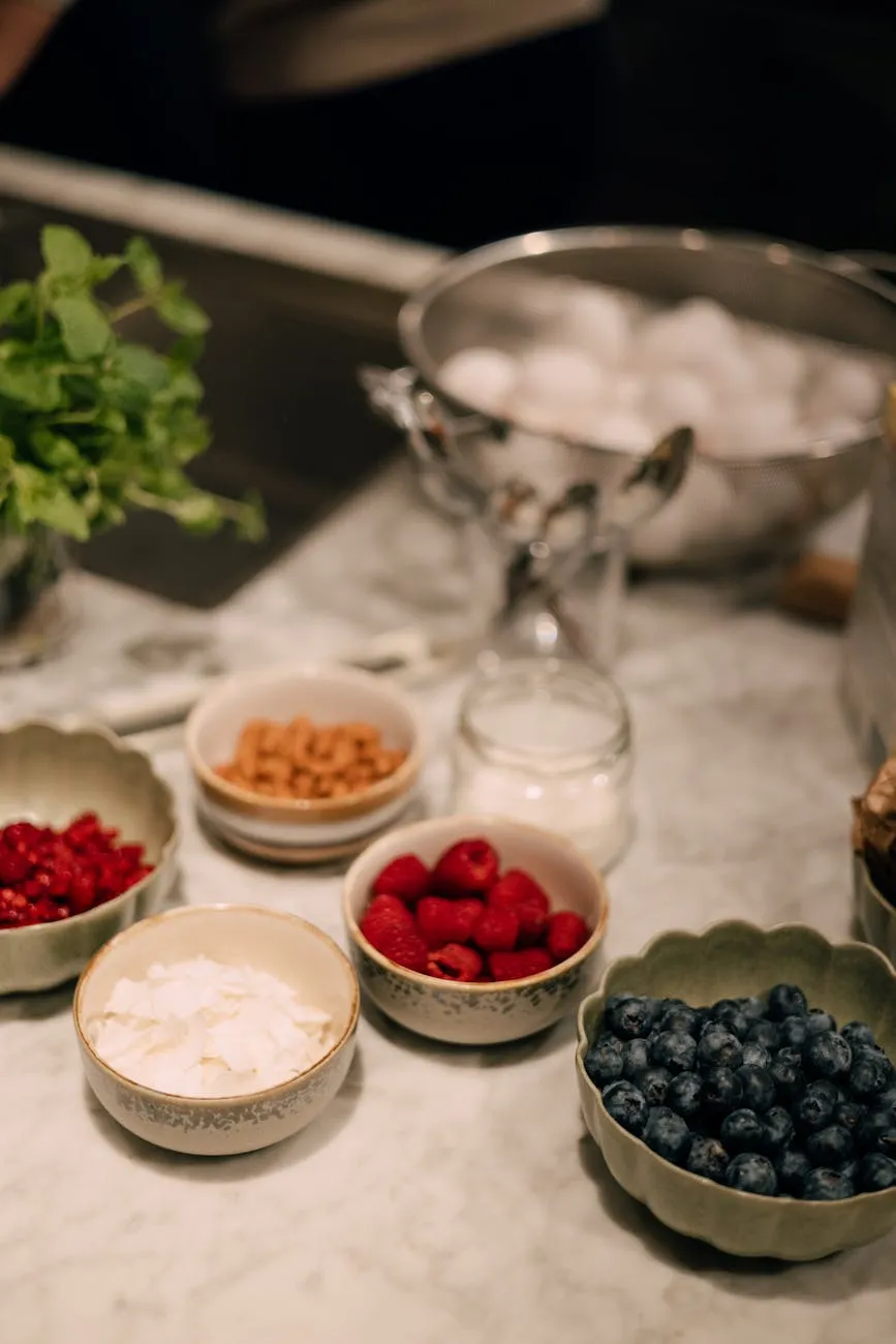 Colorful assortment of anti-inflammatory berries and dark fruits arranged in bowls alongside nuts and leafy greens