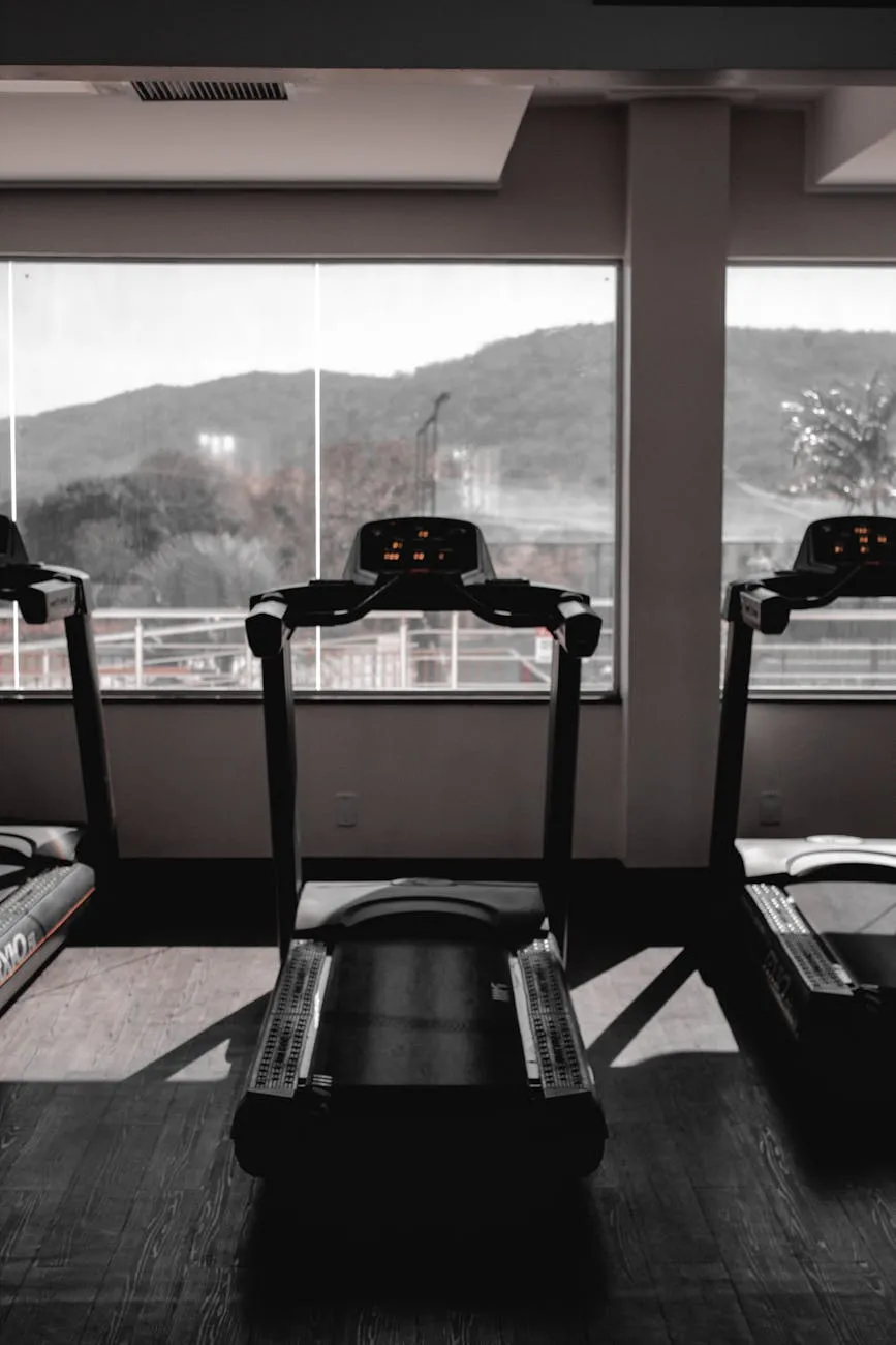 Athletic person finishing a moderate run on a treadmill with a smartwatch display showing heart rate in a bright gym