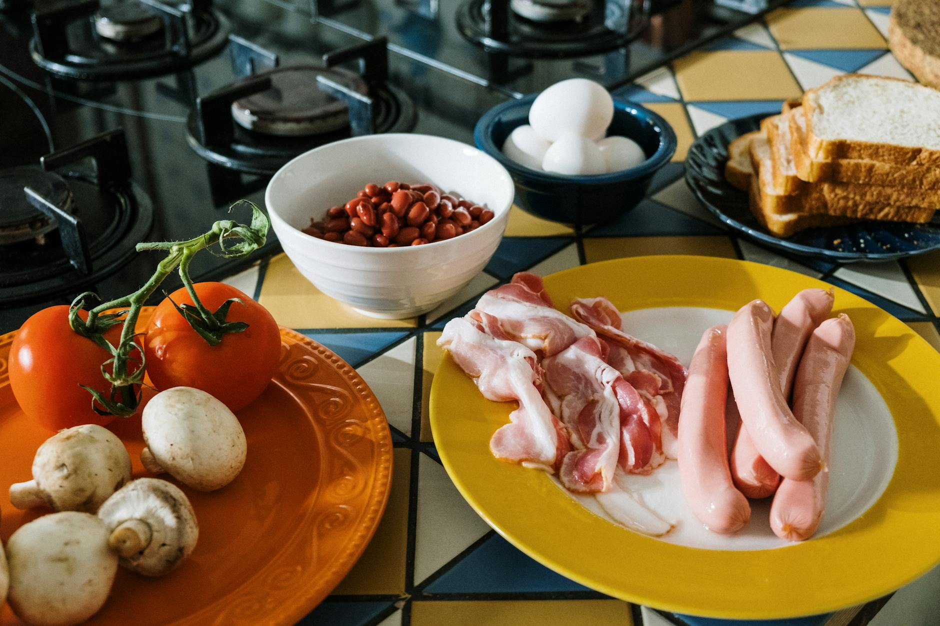 Affordable nutritious groceries including beans, eggs, frozen vegetables, rice, and bananas arranged on a kitchen counter