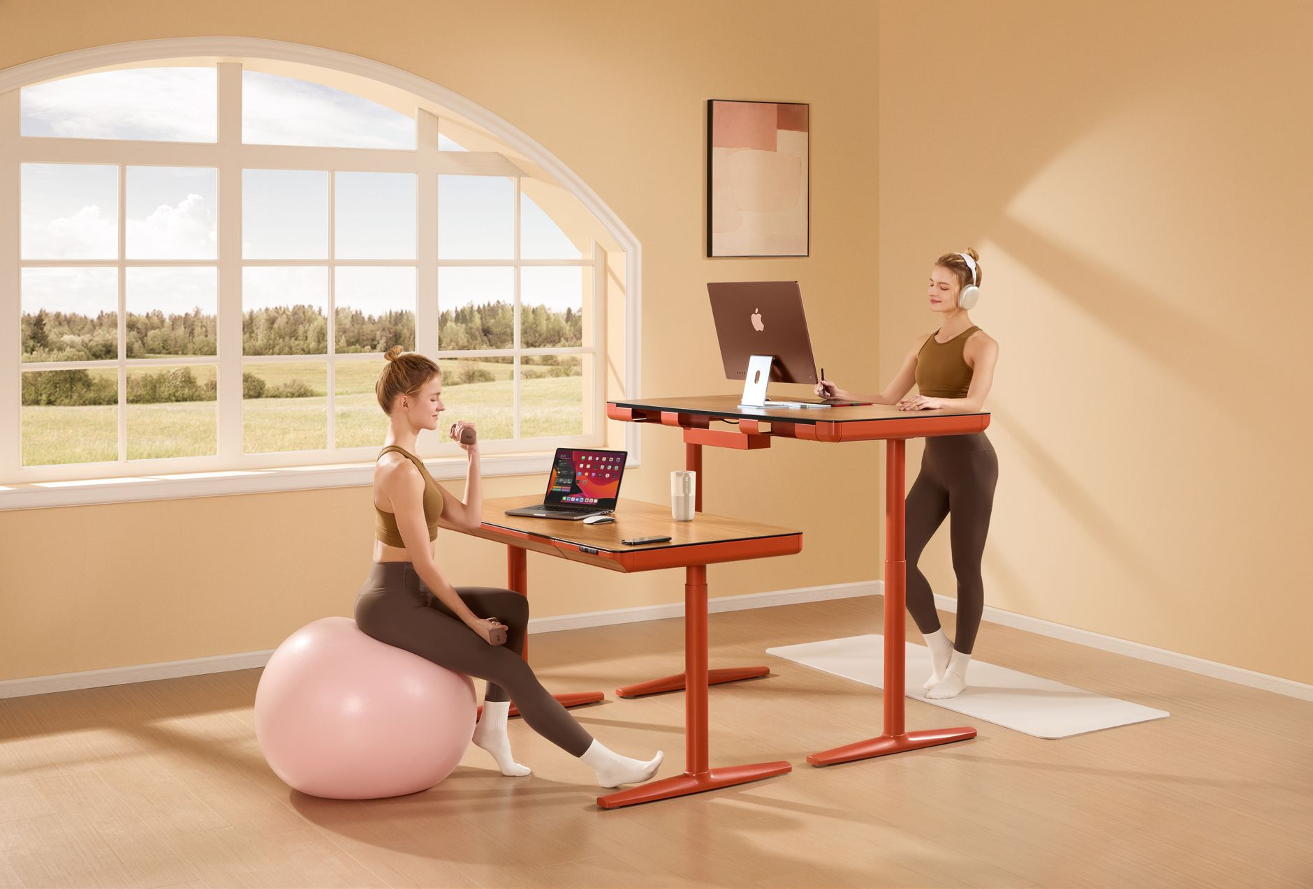 A height-adjustable desk raised to standing position with a laptop and monitor in a modern office, illustrating where standing desk calorie claims come from