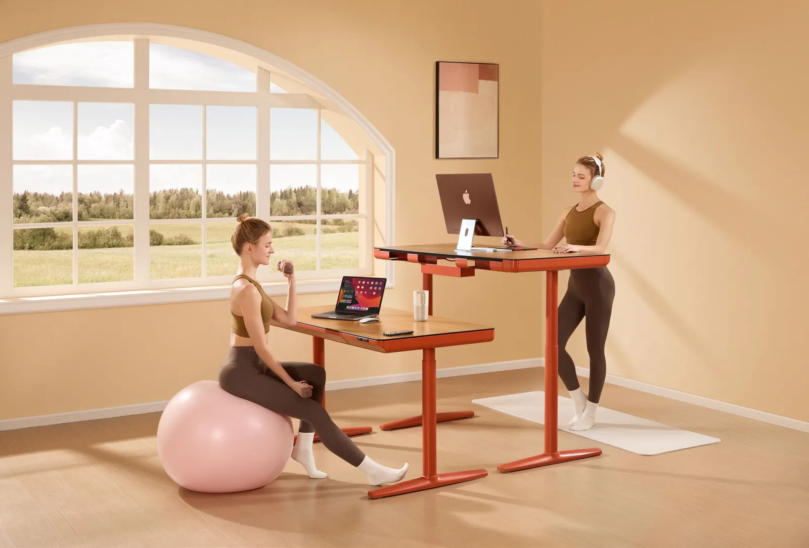 A height-adjustable desk raised to standing position with a laptop and monitor in a modern office, illustrating where standing desk calorie claims come from